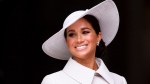FILE - Meghan, Duchess of Sussex smiles after attending a service of thanksgiving for the reign of Queen Elizabeth II at St Paul's Cathedral in London June 3, 2022 to mark the Platinum Jubilee. (Toby Melville, Pool Photo via AP, File)