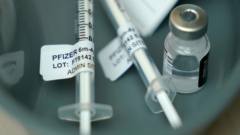 Syringes with Pfizer COVID-19 vaccine shots are seen in this file photo dated June 21, 2022. (AP Photo/Ted S. Warren)