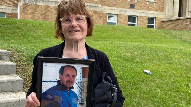 Violet Maxemiuk holds a photo she displayed while she read her victim impact statement. (Lisa Risom/CTV News)