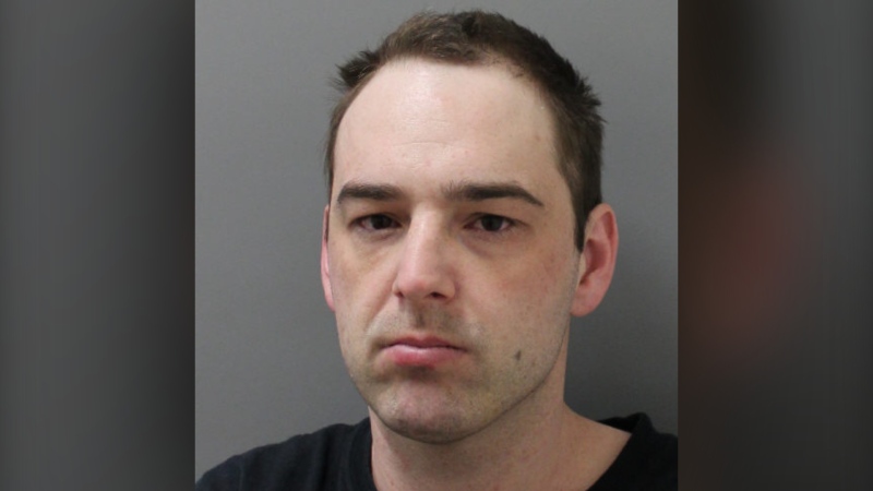 Joseph Aubut, 35, is wanted on 52 outstanding charges. He's accused of driving a vehicle directly at Didsbury RCMP during a getaway in May. (RCMP)
