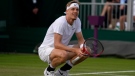 Canada's Denis Shapovalov pauses as he plays Brandon Nakashima in a second round men's single match on day four of the Wimbledon tennis championships in London, on June 30, 2022. (Alastair Grant / AP)