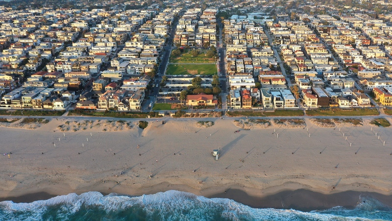 A plan to return a stretch of Southern California beachfront real estate, pictured here, on April 19, 2021, to the descendants of its Black owners, nearly a century after it was taken by the city of Manhattan Beach, is scheduled for a vote by the Los Angeles County Board of Supervisors. (Mario Tama/Getty Images)
