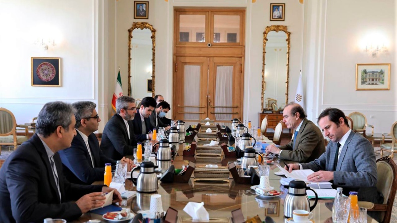 In this photo released by the Iranian Foreign Ministry, Enrique Mora, a leading European Union diplomat, second right, attends a meeting with Iran's top nuclear negotiator Ali Bagheri Kani, third left, in Tehran, Iran, Sunday, March 27, 2022. (Iranian Foreign Ministry via AP)