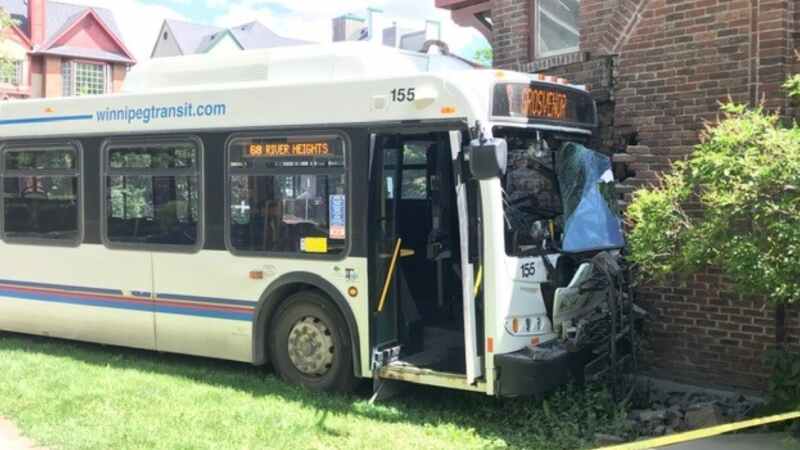 A crash involving a Transit bus that appears to have smashed into a home has shut down a section of River avenue in Winnipeg on June 30, 2022. (Source: Joey Slattery/ CTV News Winnipeg)
