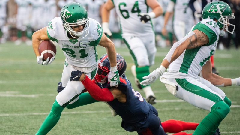 Montreal Alouettes' Mike Jones (8) tackles Saskatchewan Roughriders' Mitchell Picton during first half CFL football action in Montreal, Thursday, June, 23, 2022. THE CANADIAN PRESS/Graham Hughes