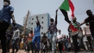 Sudanese anti-military protesters march in demonstrations in the capital of Sudan, Khartoum on June 30, 2022. (AP Photo/Marwan Ali)