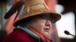 FILE - Assembly of First Nations National Chief RoseAnne Archibald wears a hat given to her by the Chehalis First Nation as she speaks during a news conference ahead of a Tk'emlups te Secwepemc ceremony to honour residential school survivors and mark the first National Day for Truth and Reconciliation, in Kamloops, BC., on Thursday, September 30, 2021. THE CANADIAN PRESS/Darryl Dyck