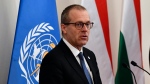 Hans Kluge, Regional Director for Europe at the World Health Organization (WHO) hold a press conference in Budapest, April 21, 2021. (Zoltan Mathe/MTI via AP)