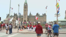 People gather outside Parliament Hill on Canada Day. (Ryan Arden/CTV News Ottawa)