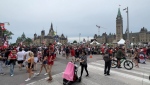 Thousands of people pack Wellington Street in front of Parliament Hill for Canada Day festivities. (Jeremie Charron/CTV News Ottawa) 