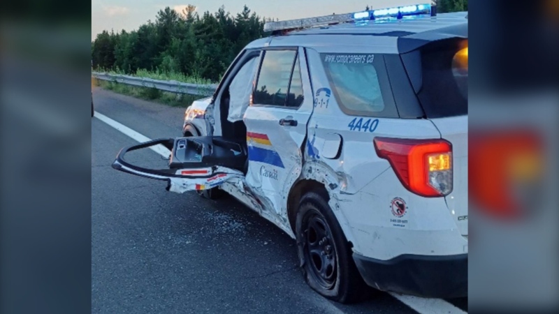 A damaged Royal Canadian Mounted Police vehicle is seen in Tracadie, N.B., in a June 29, 2022, handout photo. A 50-year-old New Brunswick woman is facing an impaired driving charge following a head-on collision with a fully marked RCMP vehicle in the village of Tracadie. THE CANADIAN PRESS/HO-RCMP