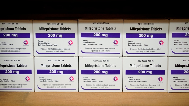 FILE - Boxes of the drug mifepristone line a shelf at the West Alabama Women's Centre in Tuscaloosa, Ala., on March 16, 2022. (AP Photo/Allen G. Breed, File)