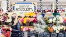 There's a strategic reason why so many grocery stores put bouquets front and centre. (Jeenah Moon/Bloomberg/Getty Images/CNN)