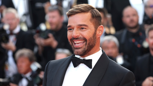 Ricky Martin poses for photographers upon arrival at the premiere of the film 'Elvis' at the 75th international film festival, Cannes, southern France, Wednesday, May 25, 2022. (Photo by Vianney Le Caer/Invision/AP)