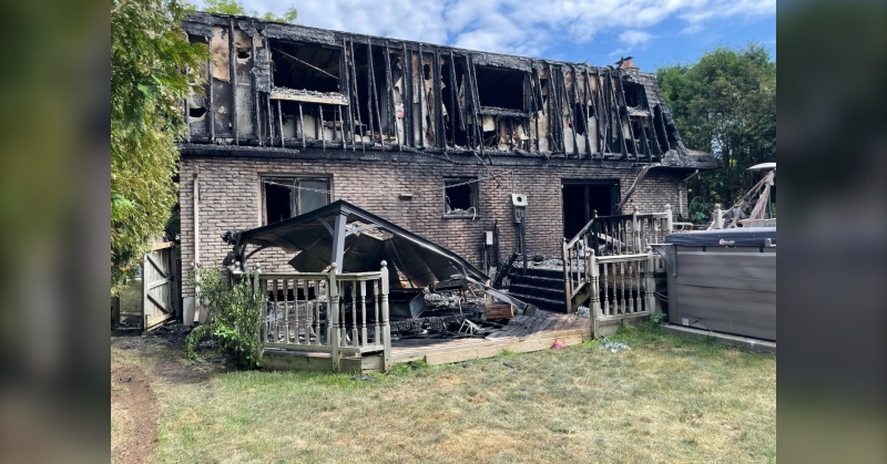 An overnight fire at a home on Guildford Crescent in London, Ont. on July 3, 2022 claimed the lives of three pets and caused an estimated $250,000 in damages. Fire investigators say the blaze is believed to have started near the fire pit. (Sean Irvine/CTV News London)