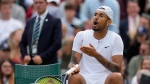 Australia's Nick Kyrgios complains to the umpire about a line call after losing a point to Greece's Stefanos Tsitsipas during a third round men's singles match on day six of the Wimbledon tennis championships in London, Saturday, July 2, 2022. (AP Photo/Kirsty Wigglesworth)