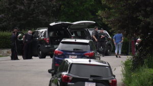CPS members in Upper Mount Royal on July 3 during the investigation into the discovery of the body of 34-year-old Shawn McCormack in an alleyway.