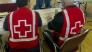 Canadian Red Cross workers on Friday, May 6, 2011 in St-Jean-sur-Richelieu, Quebec. (THE CANADIAN PRESS/Ryan Remiorz)