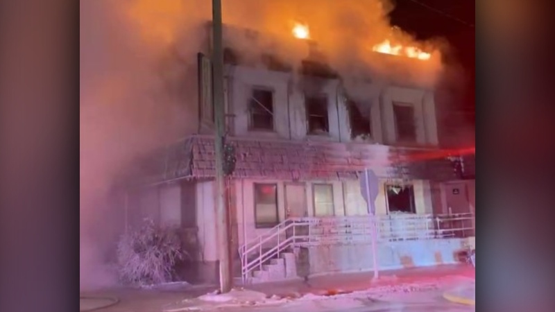 Flames engulf the Bowden Hotel in Bowden, Alta. on Jan. 1. (Facebook/Olds Fire Department)