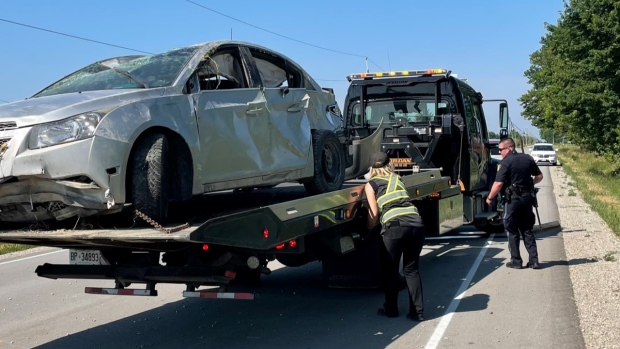 A vehicle is taken away from the scene of a crash on Plover Mills Road south of St. Mary's on July 4, 2022. (Marek Sutherland/CTV News London)