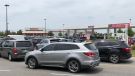 Drivers line up for gas at the Costco gas bar in Windsor, Ont., on Monday, July 7, 2022. (Gary Archibald/CTV News Windsor)