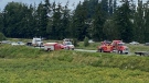 A stolen Surrey Fire vehicle is pictured on the side of the highway in Abbotsford, B.C., on Monday, July 4, 2022. (Scott Connorton / CTV News Vancouver)