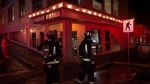 Firefighters respond to the Komox Grind coffee shop on July 5, 2022. (CTV News)