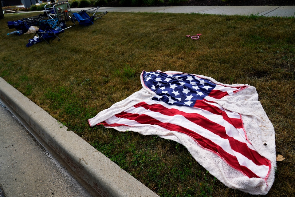 A discarded American flag towel after shooting 