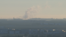 Smoke from a Wednesday morning scrapyard fire in the Saddle Ridge Industrial Area was visible throughout northeast Calgary.