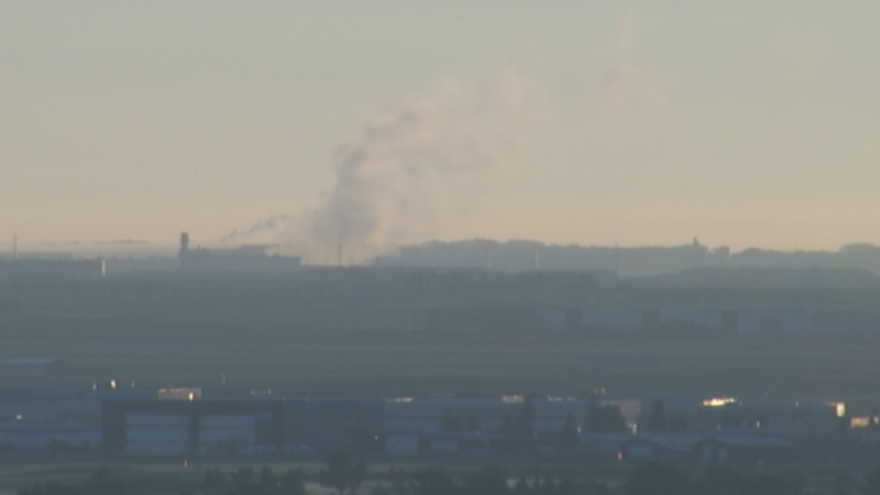 Smoke from a Wednesday morning scrapyard fire in the Saddle Ridge Industrial area was visible throughout northeast Calgary.