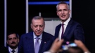 Turkish President Recep Tayyip Erdogan, second left, and NATO Secretary General Jens Stoltenberg before signing a memorandum in which Turkey agrees to Finland and Sweden's membership of the defense alliance in Madrid, Spain on Tuesday, June 28, 2022.
