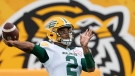 Edmonton Elks quarterback Tre Ford (2) throws during warm up prior to CFL football game action against the Hamilton Tiger Cats in Hamilton, Ont., Friday, July 1, 2022. THE CANADIAN PRESS/Peter Power
