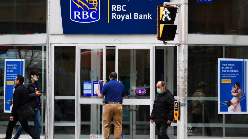 A customer enters a Royal Bank of Canada (RBC) branch in downtown Ottawa on Tuesday, May 3, 2022. THE CANADIAN PRESS/Sean Kilpatrick