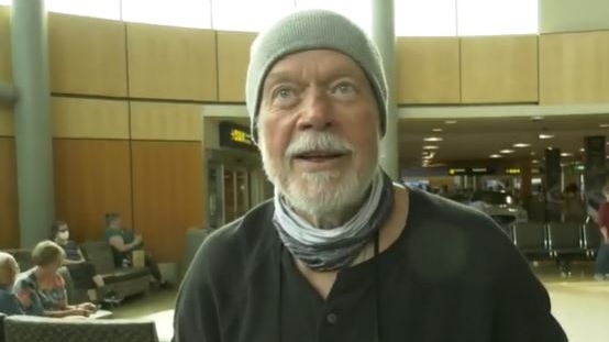 Randy Bachman in the arrivals area of Victoria International Airport on Wednesday, July 6, 2022. (CTV News)