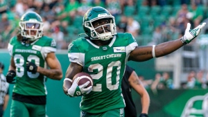 Saskatchewan Roughriders running back Frankie Hickson (20) celebrates after scoring a touchdown against the Ottawa Redblacks during first half of CFL football action in Regina, Friday, July 8, 2022. THE CANADIAN PRESS/Heywood Yu