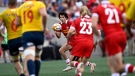 Canada's Brock Webster (14) runs with the ball during the second half of men's 15s international rugby action against Spain in Ottawa, on Sunday, July 10, 2022. (Justin Tang/THE CANADIAN PRESS)