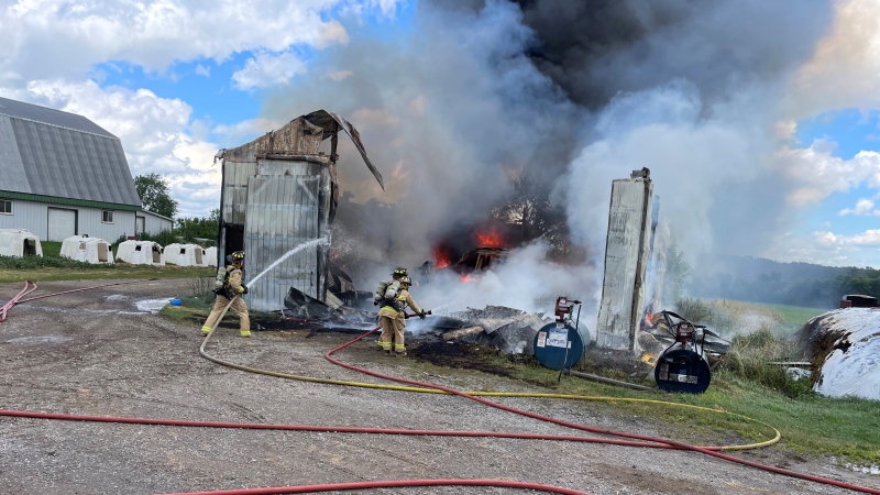Fire crews gain control of a blaze at a large equipment garage in rural Ottawa. July 12, 2022. (Courtesy / Ottawa Fire Services).