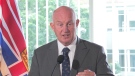 Minister of Public Safety Mike Farnworth is seen at a news conference on July 18, 2022.