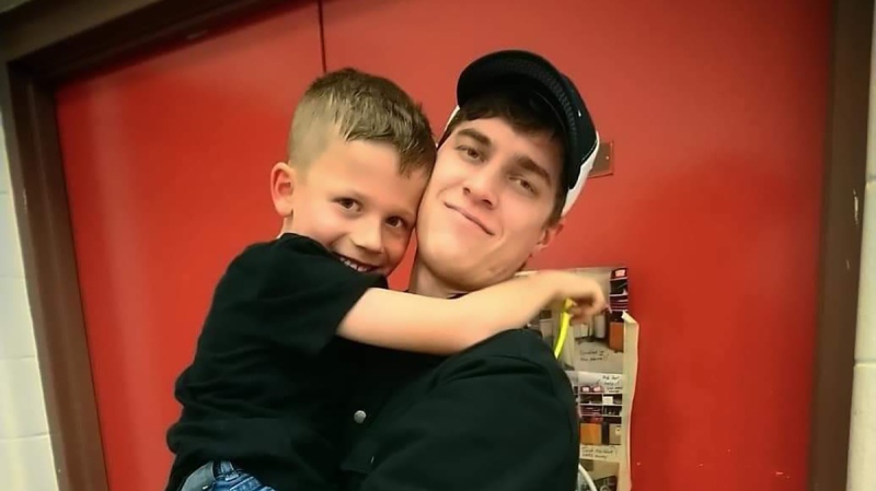 Jesse Bourne and his nine-year-old son Carson are supposed to go to Disney World on Saturday for a surprise vacation, but passport delays have put the trip in jeopardy. (Courtesy: Jesse Bourne)