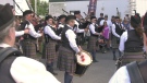 The Glengarry Pipes and Drums playing at the Glengarry Highland Games in Maxville, Ont. on Friday. (Nate Vandermeer/CTV News Ottawa)