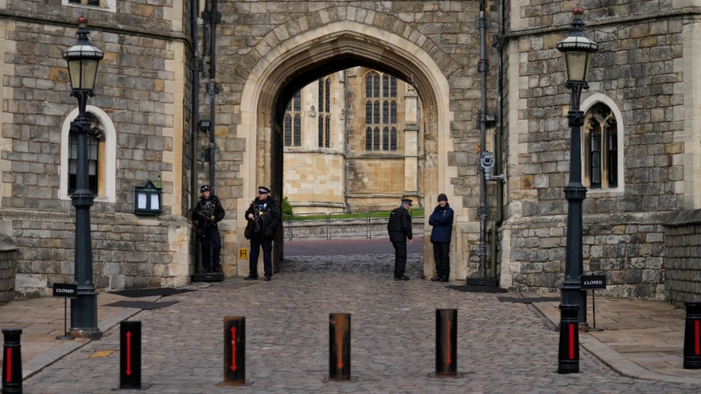 Police guard the Henry VIII gate to Windsor Castle