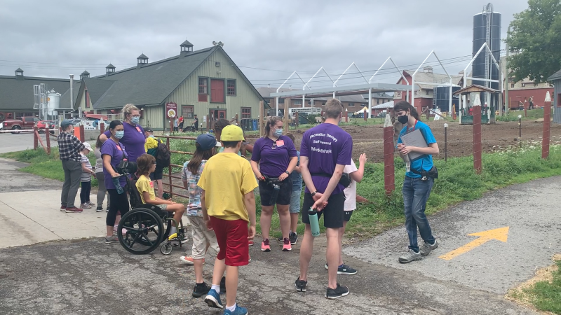 Kids from CHEO’s recreation therapy program are integrated into day camps like the one at Canada Agriculture Food Museum. (Jackie Perez/CTV News Ottawa)