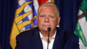 Premier Doug Ford looks on as fellow premiers answer questions from the media on the final day of the summer meeting of the Canada's Premiers at the Fairmont Empress in Victoria, B.C., on Tuesday, July 12, 2022. THE CANADIAN PRESS/Chad Hipolito