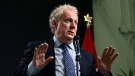 Conservative leadership candidate Jean Charest answers questions from reporters after the third debate of the 2022 Conservative Party of Canada leadership race, in Ottawa, Aug. 3, 2022. THE CANADIAN PRESS/Justin Tang