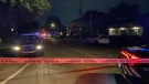 Police tapes blocks access to a street where a man was fatally shot on Wednesday, Aug. 3, 2022. (Cosmo Santamaria/CTV News)