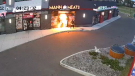 On Aug. 1, 2022, security footage captures the moment when someone runs up from behind Mann Meats & Indian Cuisine in southeast Edmonton, appears to break the front door with a rock, light a homemade bomb on fire and throw it at the door. They then run off in the same direction they came from. A first attack of the same kind was made on July 30, 2022.