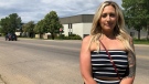 Caitlin Erickson stands across the street from a Saskatoon Christian school were she says she and others suffered physical and emotional abuse. (Pat McKay/CTV News)