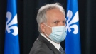 Quebec interim health director Dr. Luc Boileau arrives to give a COVID-19 update, Thursday, April 21, 2022 in Montreal. The Quebec health department is recommending the extension of the mask mandate until the middle of May.THE CANADIAN PRESS/Ryan Remiorz