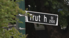 A Trutch Street sign with the "C" covered is seen in Vancouver, B.C., on Aug. 3, 2022.
