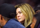 Ellen Pompeo watches during the second half of an NBA basketball game between the Los Angeles Clippers and the Boston Celtics, Monday, March 28, 2016, in Los Angeles. The Clippers won 114-90. (AP Photo/Mark J. Terrill)